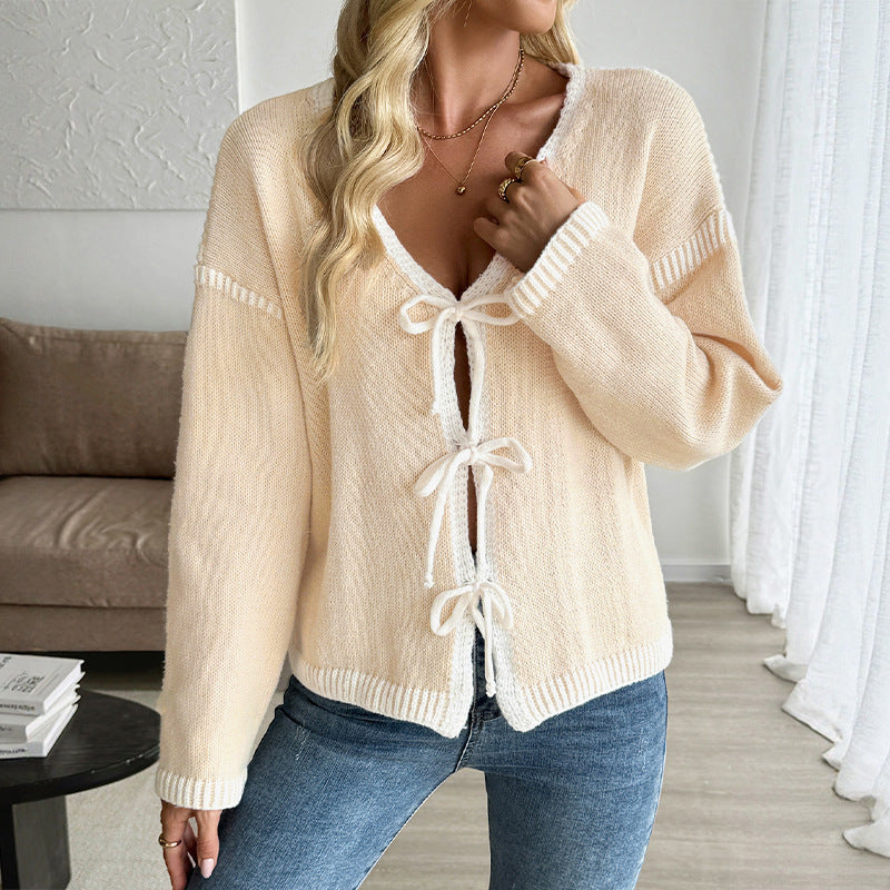 Ladies knitted cardigan with bow closure and deep V-neck Mune Fashion