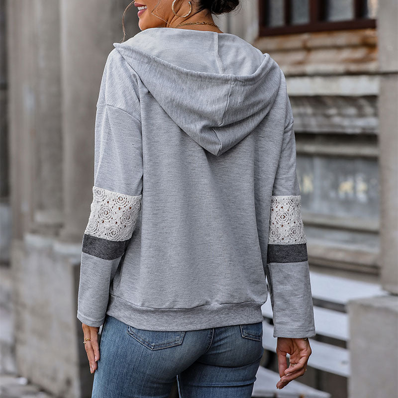Women's hooded sweater with V-neck, kangaroo pocket, and contrasting sleeves Mune Fashion