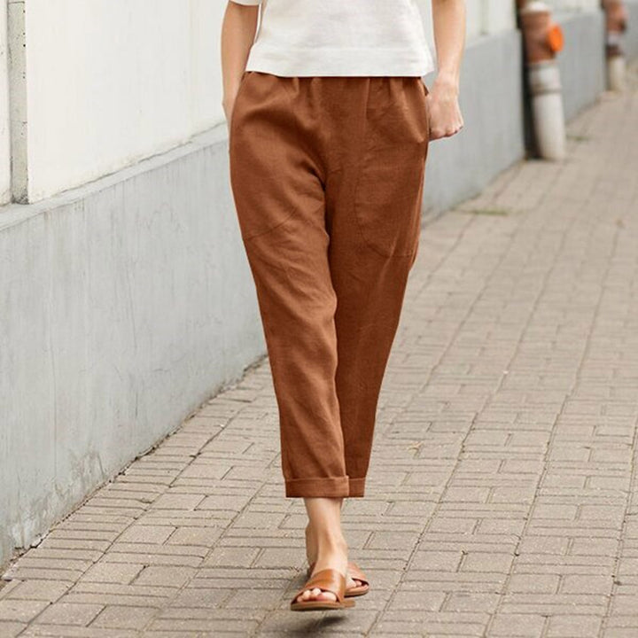Women's light linen pants with elastic waistband, side pockets, and rolled hem Mune Fashion