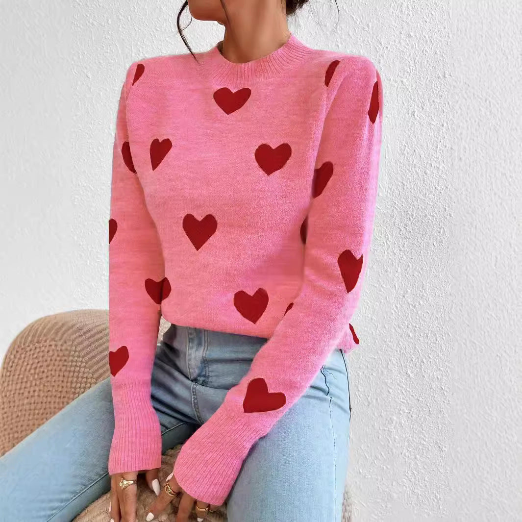 Women’s cashmere-like fine knit sweater with all-over heart pattern, round neckline and extended cuffs Mune Fashion