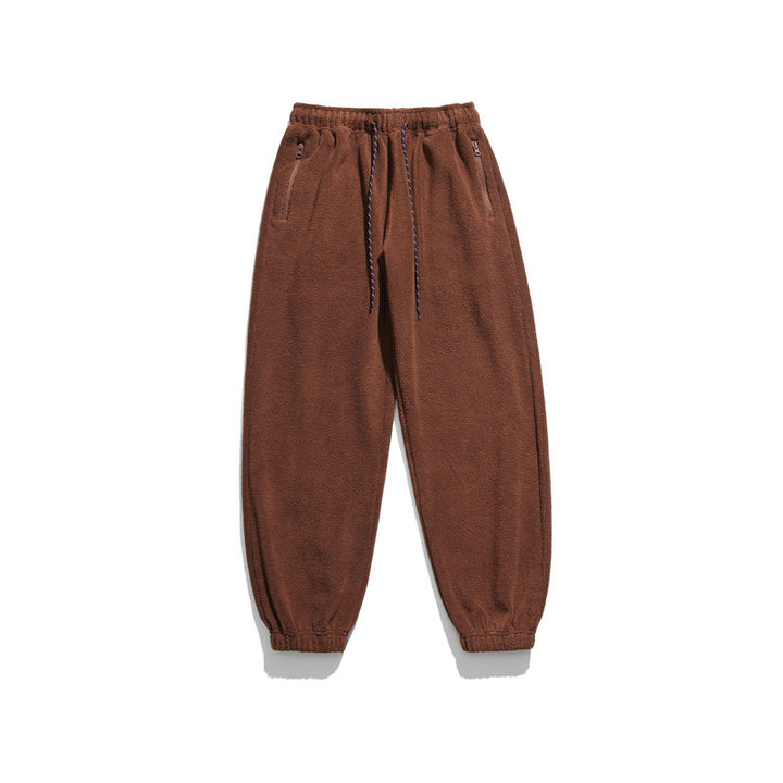 Men's wide-cut fleece jogging pants with elastic cuffs and side pockets Mune Fashion
