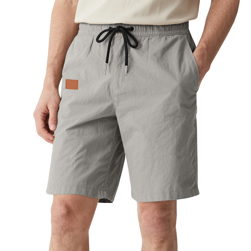 Men's quick-drying swim shorts in Bermuda cut with elastic waistband and drawstring Mune Fashion