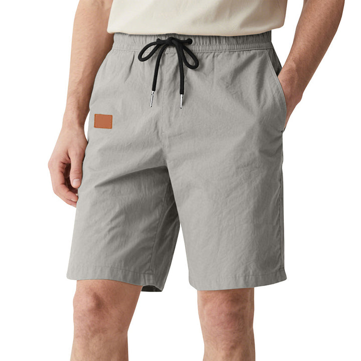Men's quick-drying swim shorts in Bermuda cut with elastic waistband and drawstring Mune Fashion