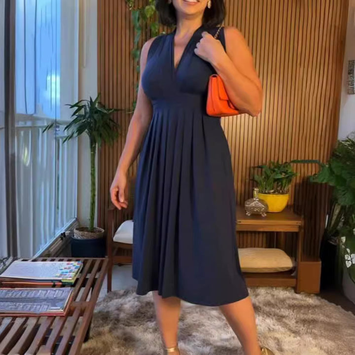 Women's sleeveless V-neck midi dress with underbust seam and flattering pleated skirt Mune Fashion