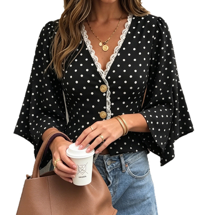 Ladies polka dot blouse with V-neck, lace trim and flared ruffle sleeves Mune Fashion