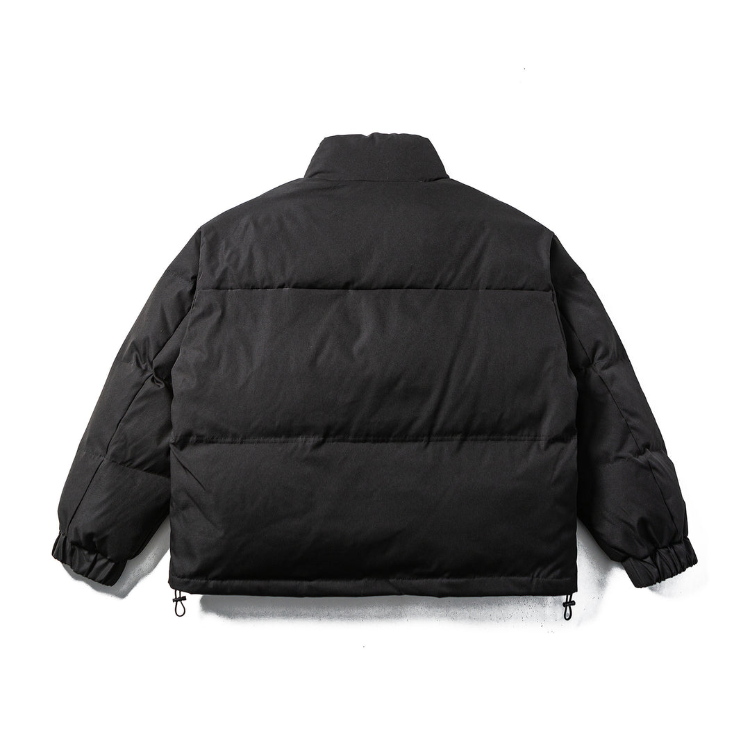Unisex Boxy-padded Puffer jacket with high standing collar, adjustable hem and utility belt Mune Fashion