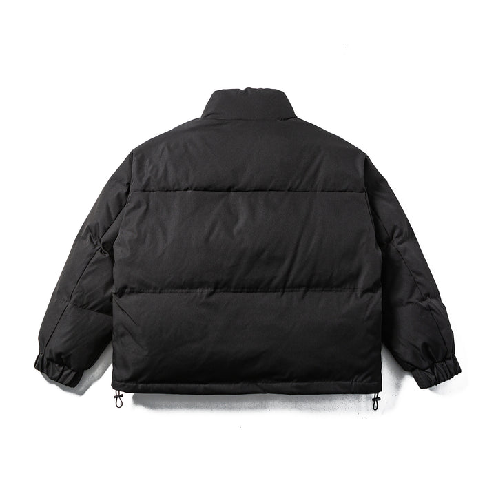 Unisex Boxy-padded Puffer jacket with high standing collar, adjustable hem and utility belt Mune Fashion