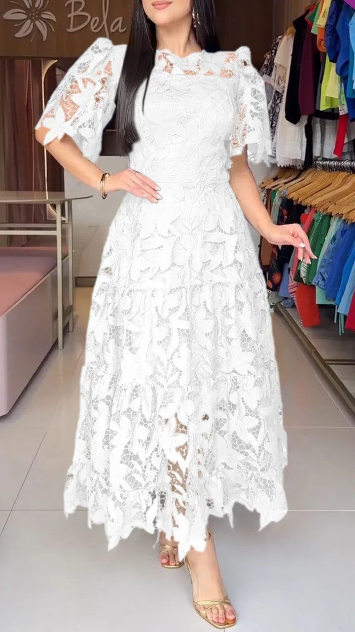 Women's maxi dress made of floral guipure lace with a fitted silhouette and tiered hem Mune Fashion