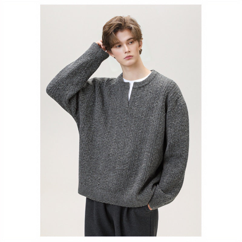 Women's chunky knitted cable pattern sweater with V-neck and layered look Mune Fashion