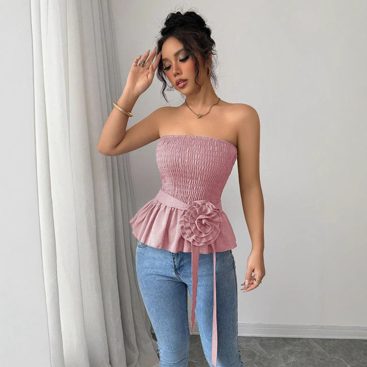 Women's fitted strapless Smok top with ruffle peplum and decorative fabric flower Mune Fashion