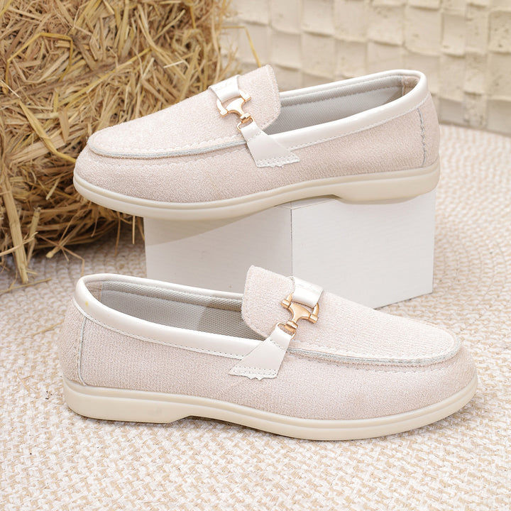 Ladies elegant suede slippers with decorative metal hardware and flexible easy-running sole Mune Fashion