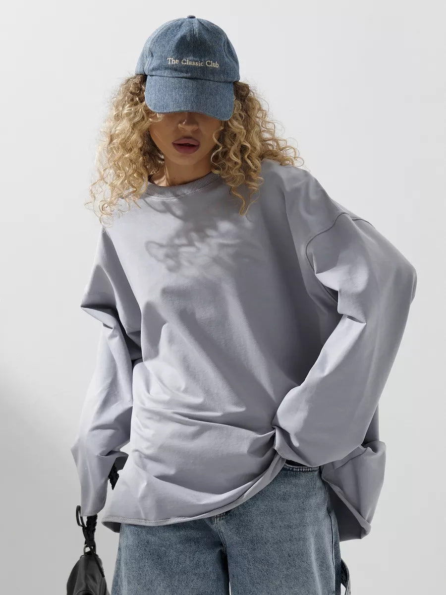 Women's loose sweatshirt with round neckline and extended oversized cut Mune Fashion