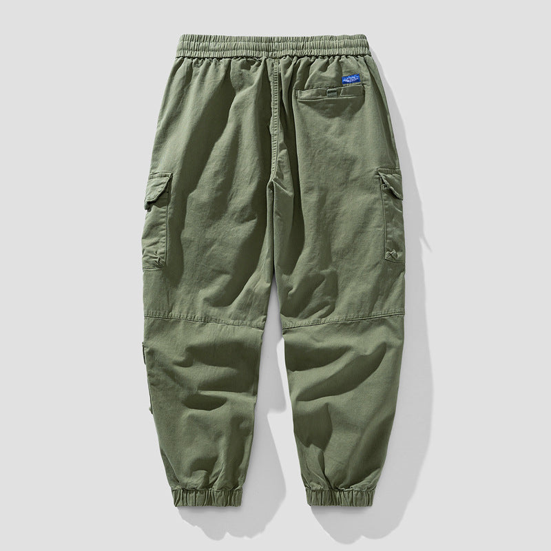Herren Leichte Canvas-Cargohose im Joggerstil mit elastischem Bund, segmentierten Kniepaneelen und verdeckten Klappentaschen Mune Fashion