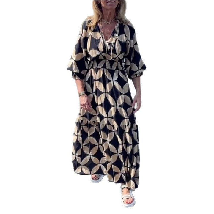 Women's maxi dress with geometric all-over print, smocked waist and ruffled tiers Mune Fashion