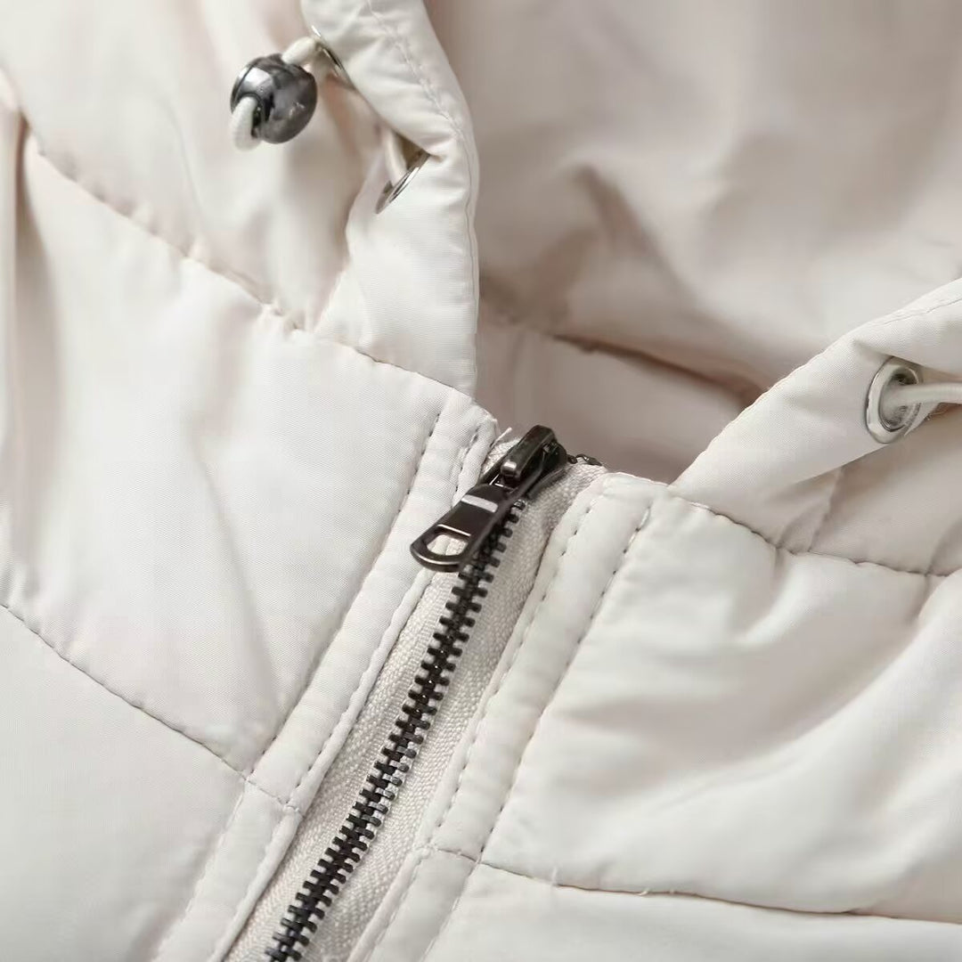 Women short-cut hybrid quilted jacket with hood, waist drawstring and elastic sleeves Mune Fashion