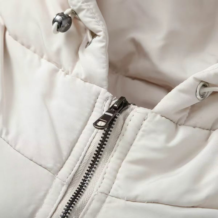 Women short-cut hybrid quilted jacket with hood, waist drawstring and elastic sleeves Mune Fashion