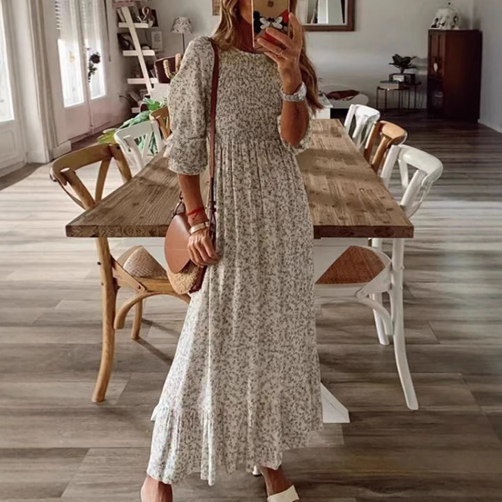 Women nan locker falling babydoll midi dress with gathered under bust, dropped three-quarter sleeves and fine floral print Mune Fashion