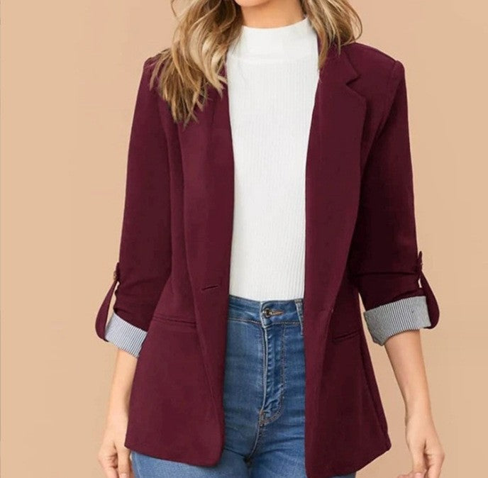 Women nan tailored casual blazer with turned-up sleeves and decorative button detail Mune Fashion