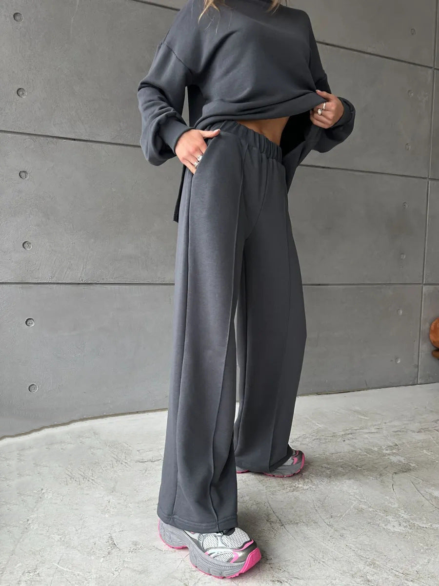 Women elegant lounge two-piece set with oversized sweatshirt and fitted wide-leg trousers Mune Fashion