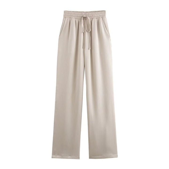 Women's pleated high-waist palazzo pants with elastic waistband, drawstring, and side pockets Mune Fashion
