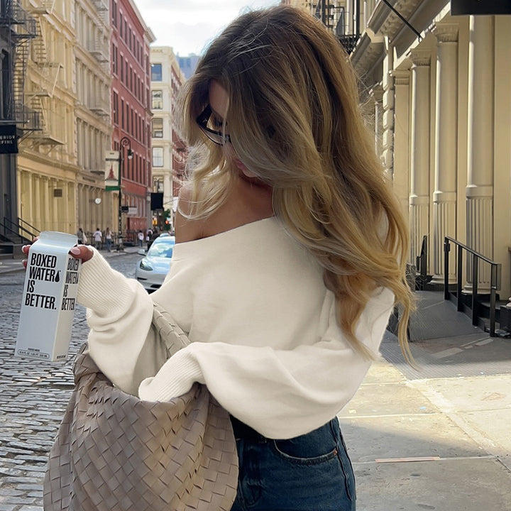 Women's off-the-shoulder cropped fine knit sweater with wide boat neckline and elastic ribbed hem Mune Fashion