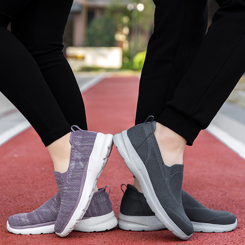 Women's slip-on knit trainer with sock-like shaft, pull tab, and responsive cushioning Mune Fashion