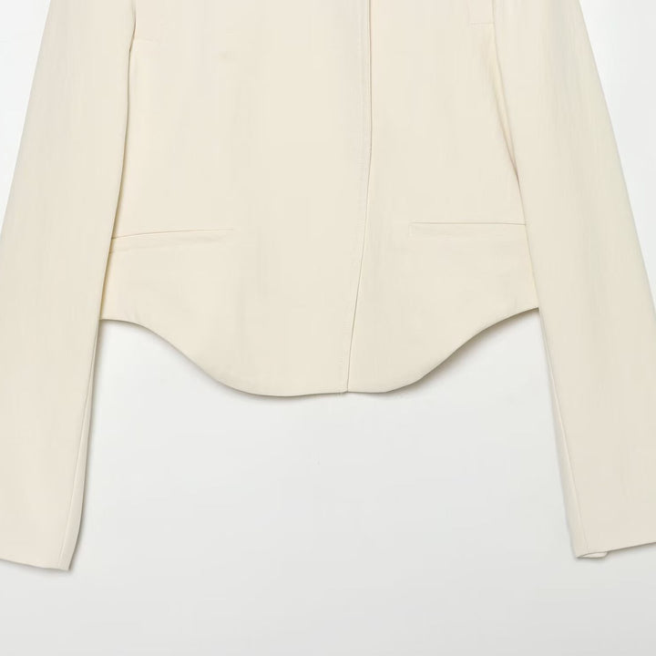 Ladies short blazer with stand-up collar, asymmetrical hem and seam pockets Mune Fashion