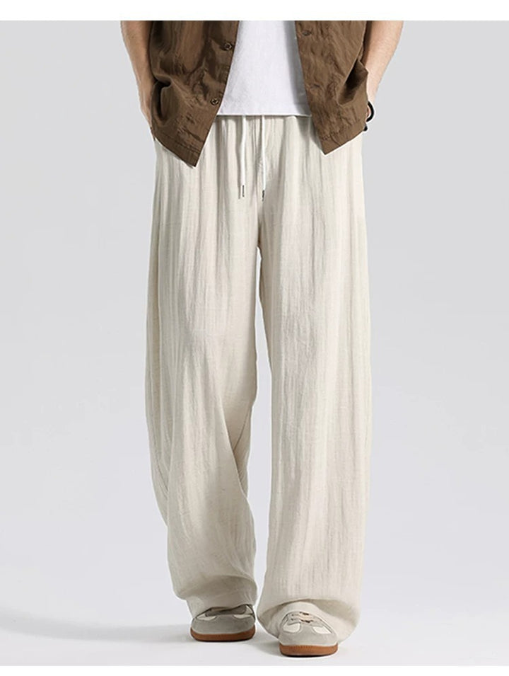 Men's wide linen pants in oversized style with drawstring and side pockets Mune Fashion