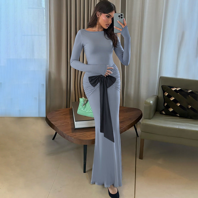 Women's Fitted Maxi Dress with Ruched Hip Section and Decorative Bow Mune Fashion