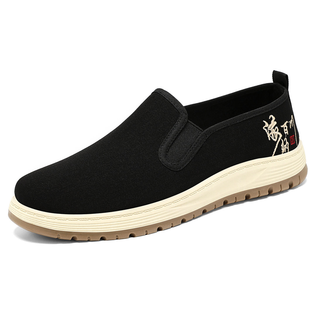 Men's seamless canvas slip-on with elastic entry, embroidered heel motif and slip-resistant EVA outsole Mune Fashion