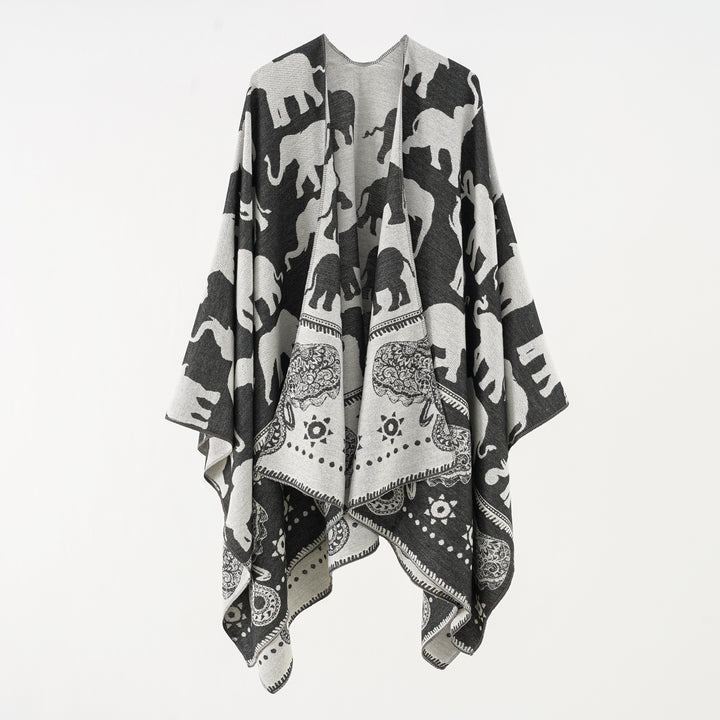 Ladies Jacquard Ruana with elephant motif and ornamental border Mune Fashion