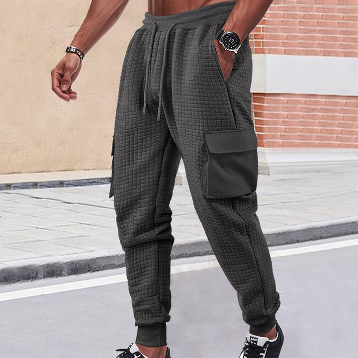 Men's quilted cargo jogging pants with waffle texture, drawstring waist and patch flap pockets Mune Fashion