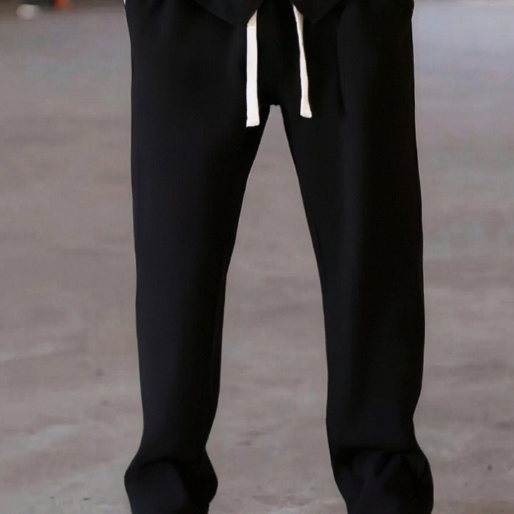 Men's loosely cut leisure pants with drawstring waistband and straight leg Mune Fashion