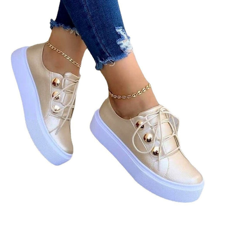 Ladies' platform sneakers in faux leather with decorative beads and padded comfort insole Mune Fashion