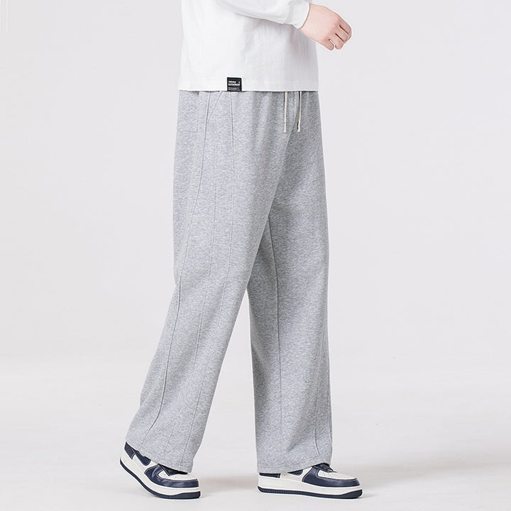 Men's leisure joggers in oversized cut with elastic drawstring waistband & distinctive side seam Mune Fashion