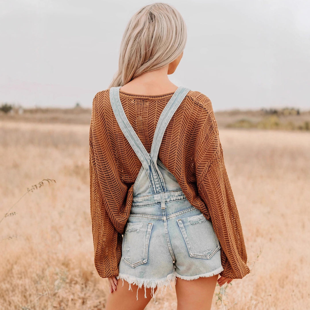 Women's oversized knitted sweater with wide boat neck, loose mesh knit and balloon sleeves Mune Fashion