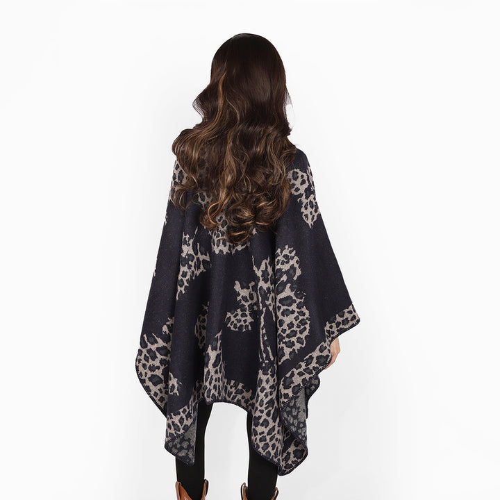 Women's wool look throw with woven leopard jacquard and open pointed edge Mune Fashion