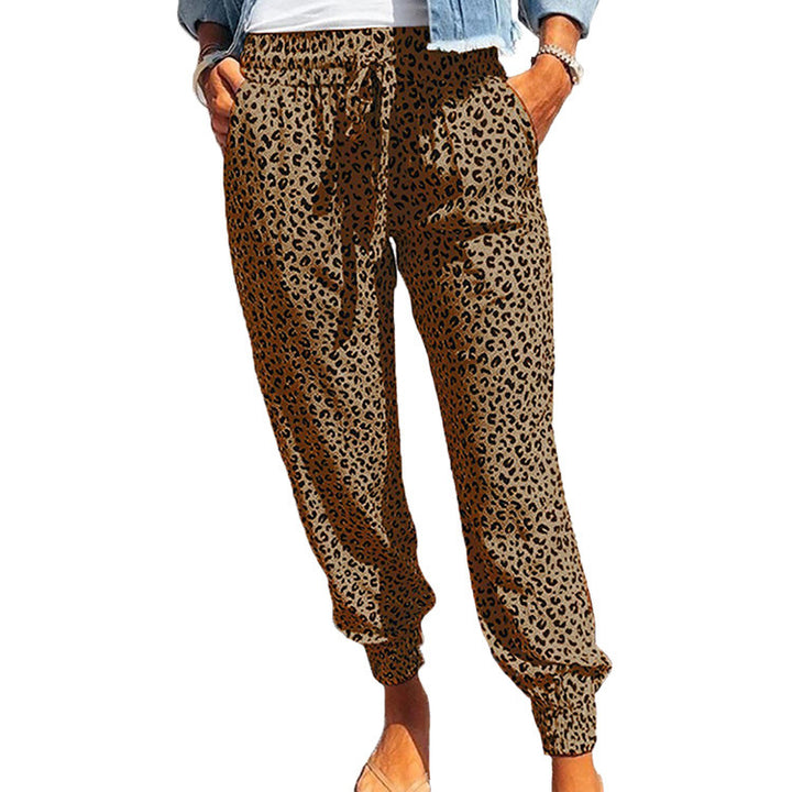 Ladies casual leopard print jogging pants with drawstring, side pockets, and elastic cuffs Mune Fashion