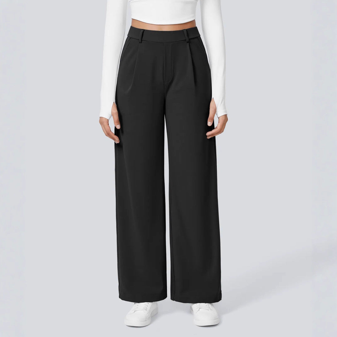 Ladies high-waisted pleated trousers with wide leg, belt loops and side pockets Mune Fashion