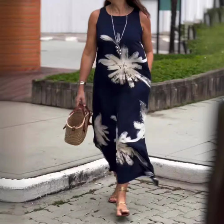 Women sleeveless casual maxi dress made of lightweight jersey with large brush flower pattern and hidden side pockets Mune Fashion