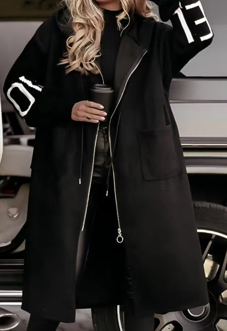 Women’s hooded coat with oversized cut, knitted sleeve cuffs and patch pockets Mune Fashion