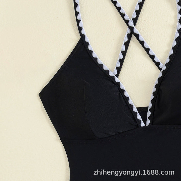 Women's One-Piece Swimsuit with Trendy Cut-Out and Clever Overwrap Mune Fashion