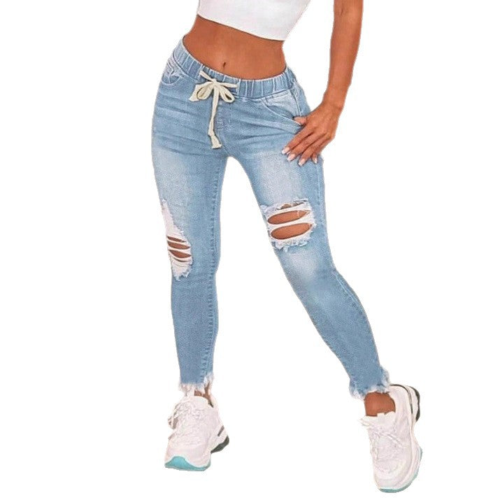 Women High-Waisted Slim Jogger Jeans with Destroyed Inserts and Drawstring Mune Fashion