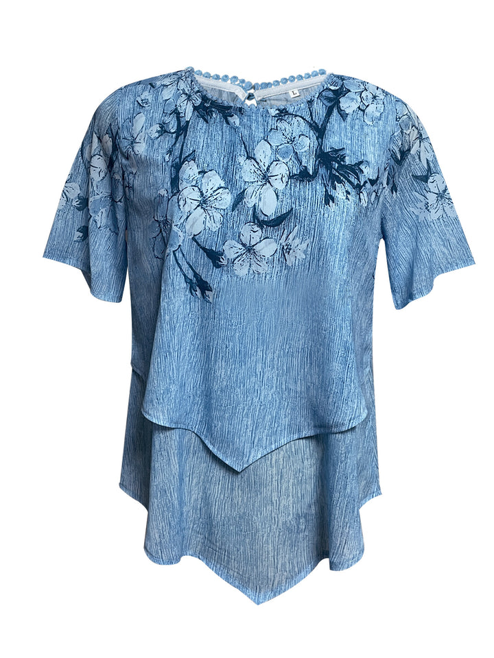Women's two-layer blouse dress with asymmetrical tiered hem, floral print yoke, and wing sleeves Mune Fashion