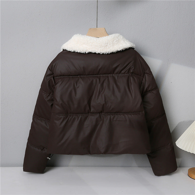 Women's quilted winter jacket with teddy collar, padded insulation, and concealed snap button closure Mune Fashion