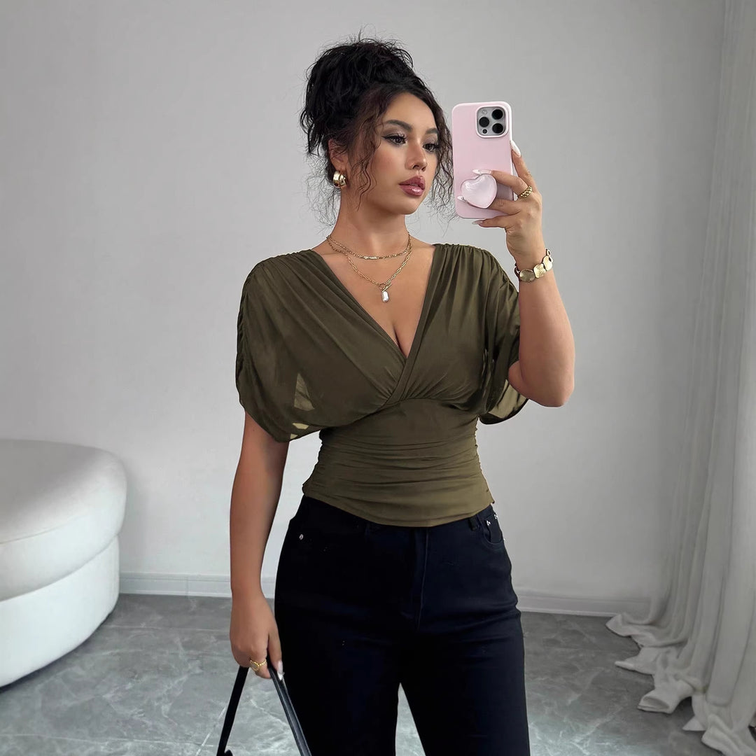 Women's fitted wrap top with deep V-neck and gathered wing sleeves Mune Fashion