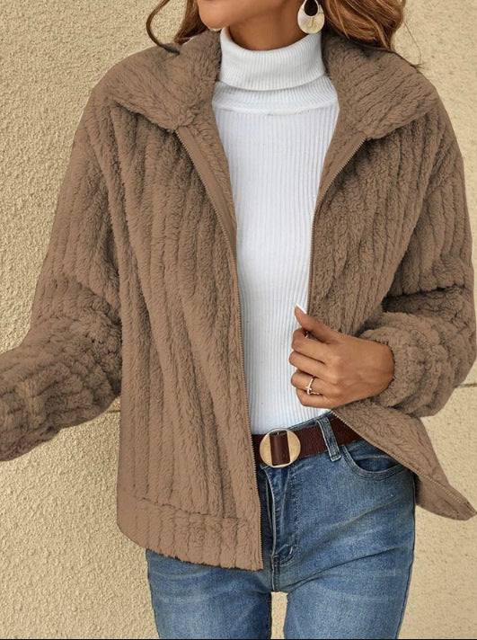 Ladies' fluffy teddy jacket with full-length zipper, stand-up collar, and front pockets Mune Fashion