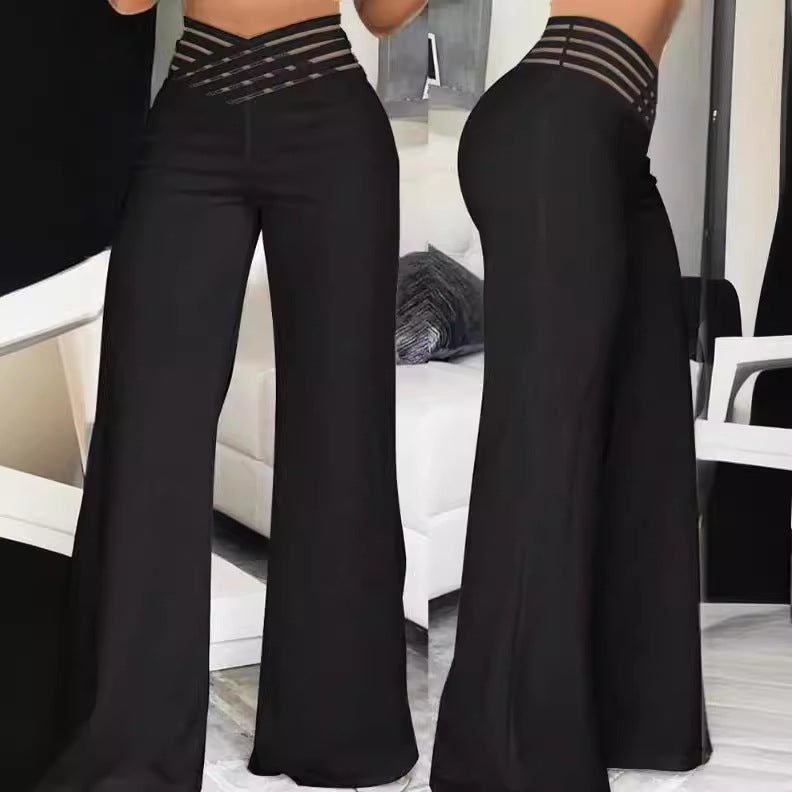 Women's high-waisted flared trousers with multi-strapped waist and wide flowing leg Mune Fashion