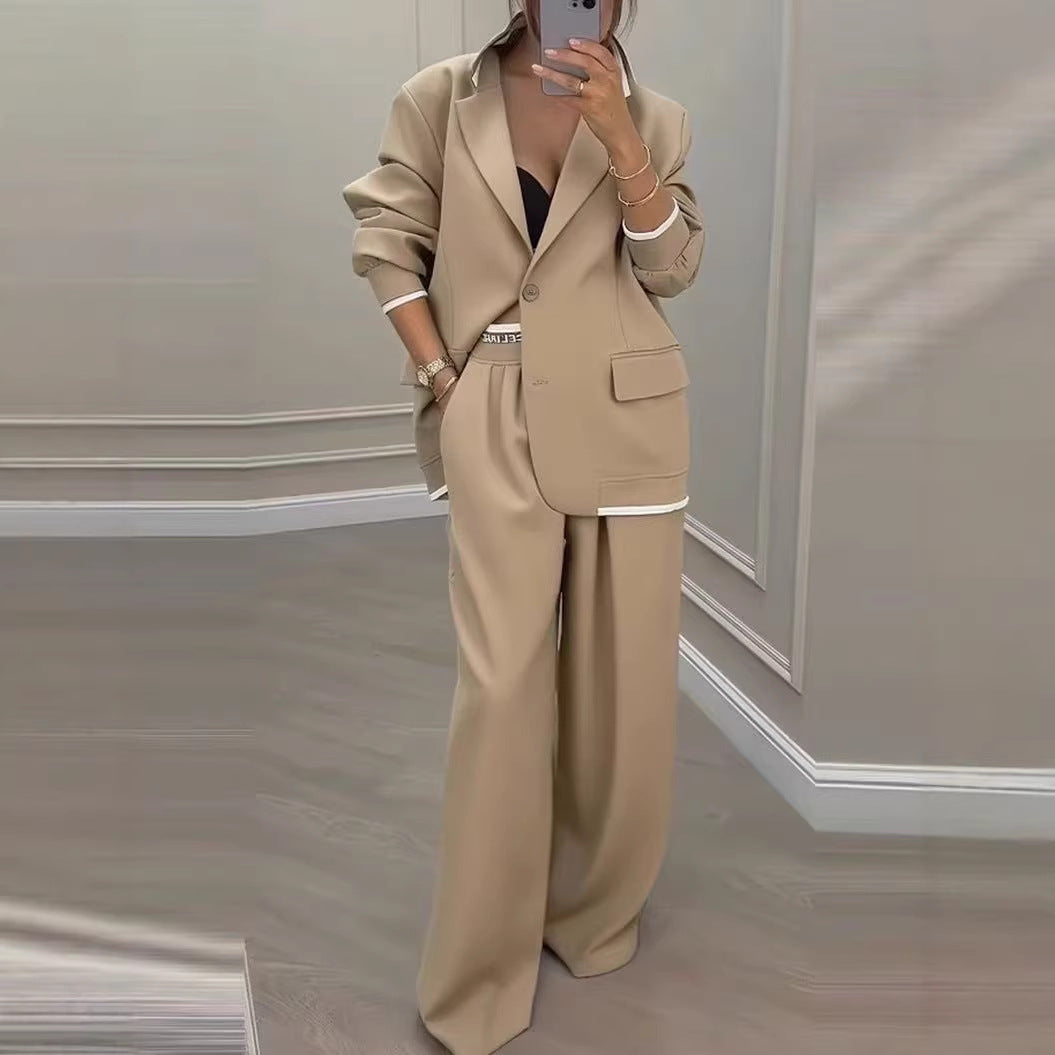 Women Oversize Tailoring Set with contrast piping, single-button blazer and high-cut wide-leg pants Mune Fashion