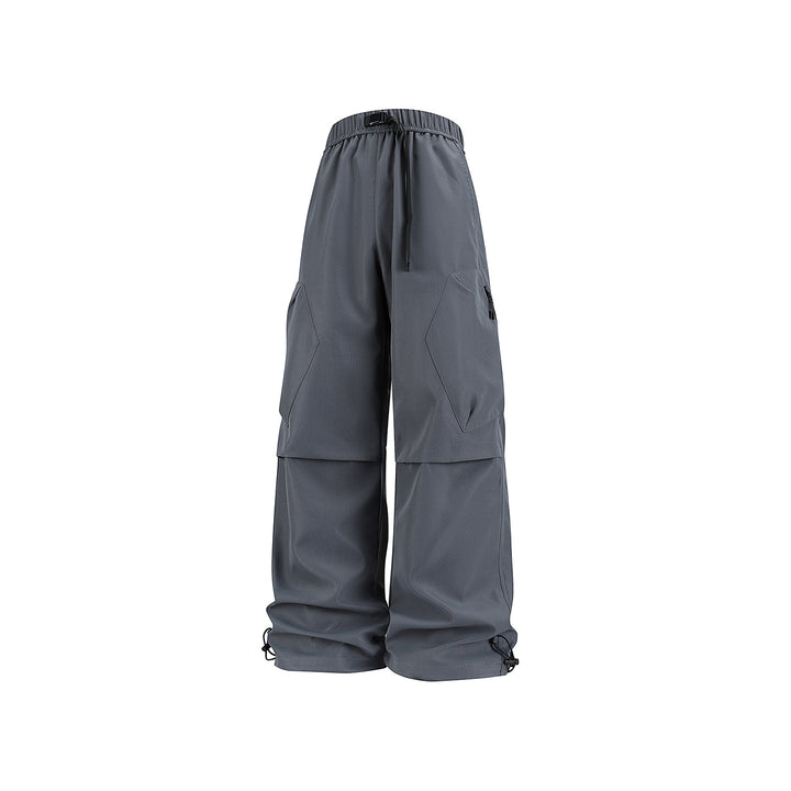 Men's wide cargo pants in baggy style with drawstring waistband, large flap pockets, and adjustable leg openings Drune
